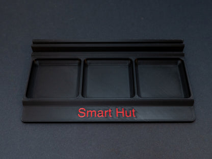 Black board game card and token holder organiser with 2 rows for cards and 3 trays for tokens. Has space at the front for personalisation photo shows red text, Suitable for a range of board games such as Wingspan, Wyrmspan, Finspan and many more.