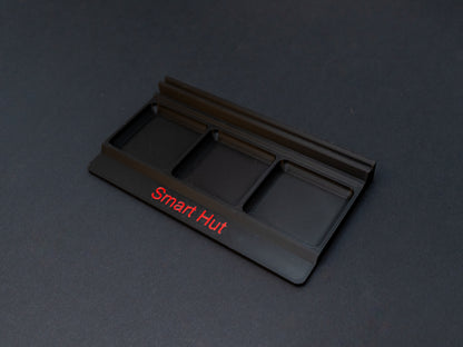 Black board game card and token holder organiser with 2 rows for cards and 3 trays for tokens. Has space at the front for personalisation photo shows red text, Suitable for a range of board games such as Wingspan, Wyrmspan, Finspan and many more.