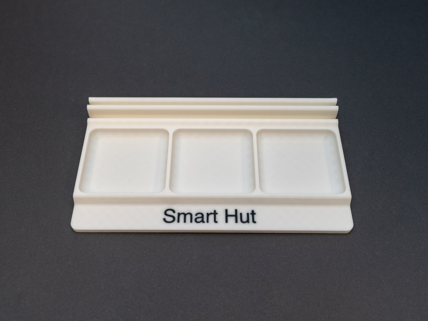 White board game card and token holder organiser with 2 rows for cards and 3 trays for tokens. Has space at the front for personalisation photo shows black text, Suitable for a range of board games such as Wingspan, Wyrmspan, Finspan and many more.