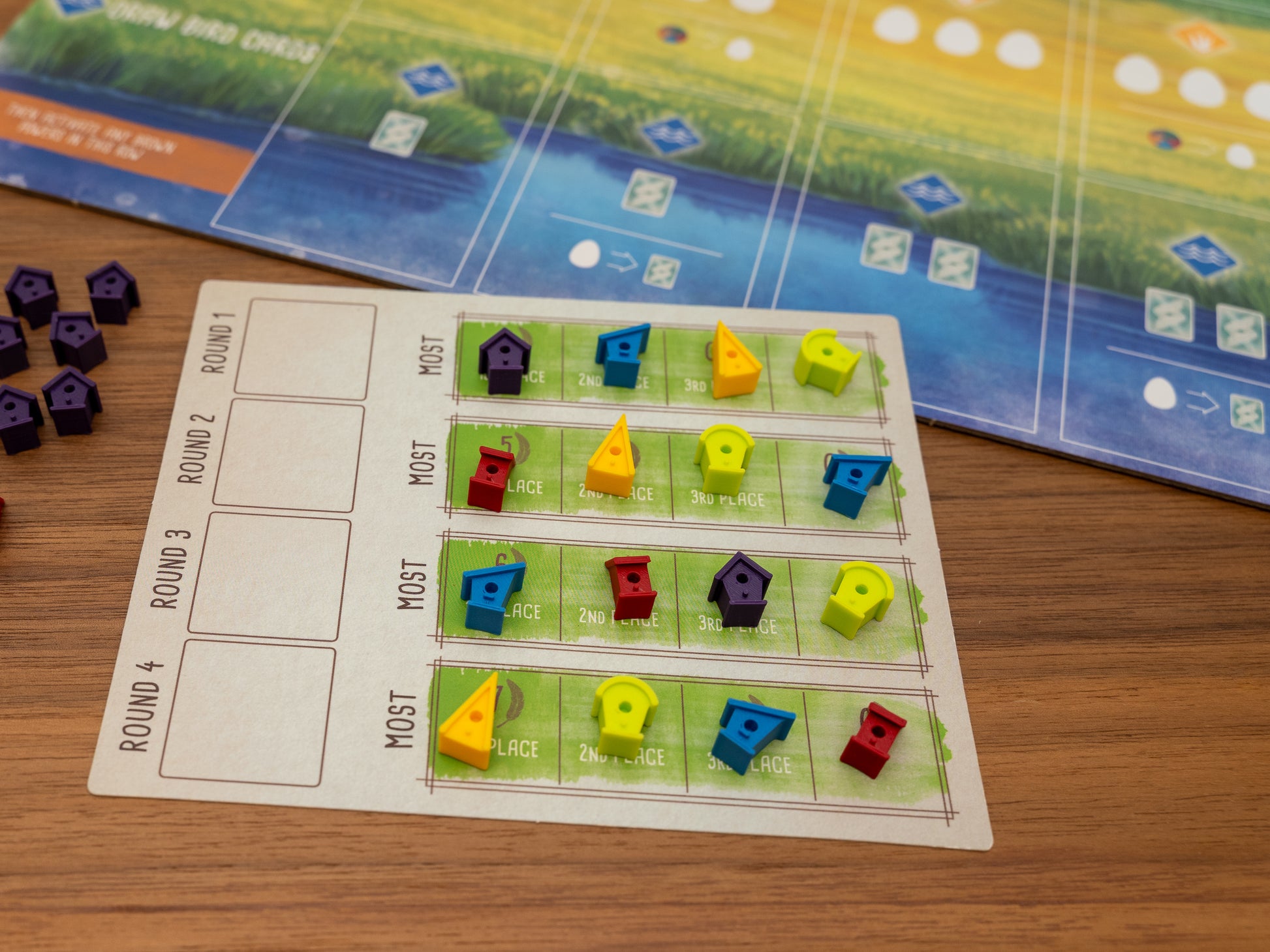Wingspan bird houses are a player token upgrade for the wooden cubes that come with the original board game. Full set for 5 players in yellow, green, blue, red and purple.