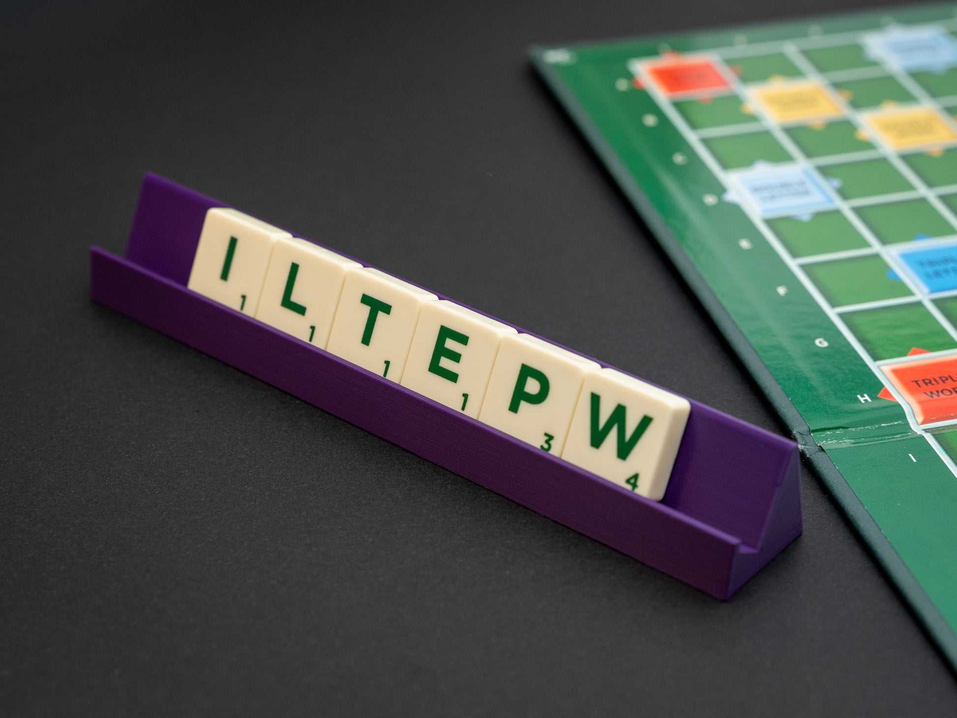Personalised indigo purple scrabble and bananagrams tile holder. Available in a range of colours - white, black, maroon red, indigo purple, apple green, olive green, pink, hot pink, blue, yellow, brown, bronze and terracotta.