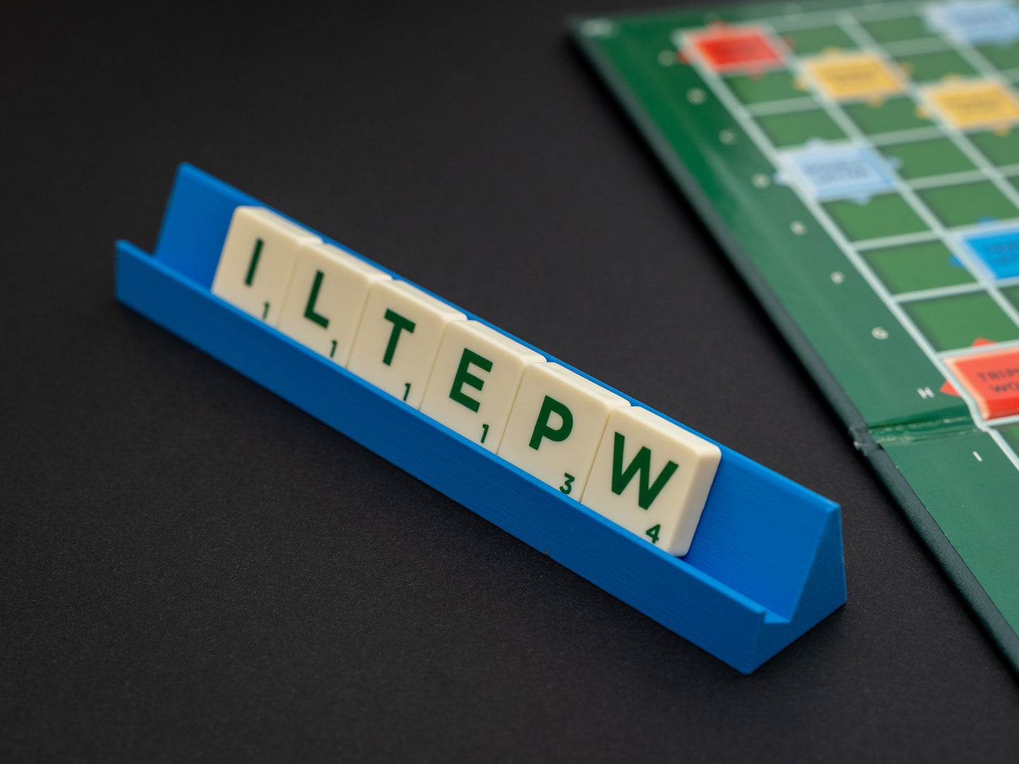 Personalised blue scrabble and bananagrams tile holder. Available in a range of colours - white, black, maroon red, indigo purple, apple green, olive green, pink, hot pink, blue, yellow, brown, bronze and terracotta.